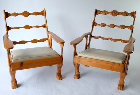 2 wooden engraved chairs